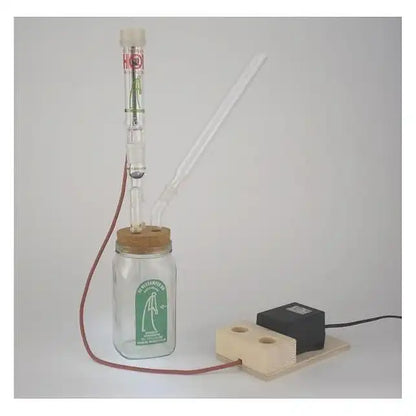 De Verdamper - strømforsyning og varmeelement med glasskrukke